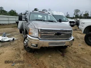 2014 Chevrolet Silverado 3500HD LTZ z VIN 1GC4K1C81EF128528, wystawiony jako Copart lot #86098474 z przebiegiem 179 717 mil mil oraz Szkoda całkowita • Salvage title. Historia ofert i sprzedaży dostępna na DreamBid. Obrazek 11.