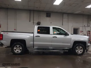 2014 Chevrolet Silverado 1500 LT with VIN 3GCUKREH9EG178197, listed as a IAAI auction lot 41407864 with 54,232 mi miles. Bid and sale history available at carsss.com. Image 13.