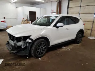 2018 Mazda CX-5 Grand Touring с VIN JM3KFBDM6J0455993, выставлен на аукционе Copart как лот 61414275 с пробегом 77 570 миль миль и Списание • Salvage title. История ставок и продаж доступна на DreamBid. Изображение 1.