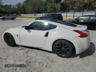 2016 Nissan 370Z z VIN JN1AZ4EH3GM931338, wystawiony jako Copart lot #43291955 z przebiegiem 69 843 mil mil oraz Szkoda całkowita • Salvage title. Historia ofert i sprzedaży dostępna na DreamBid. Obrazek 2.