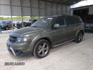 2016 Dodge Journey Crossroad with VIN 3C4PDCGG9GT235338, listed as a Copart auction lot 57097295 with 112,085 mi miles and Salvage title. Bid and sale history available at DreamBid. Image 1.