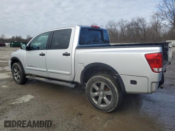 2015 Nissan Titan Pro-4X with VIN 1N6AA0EC1FN512072, listed as a Copart auction lot 85733174 with 92,460 mi miles and Salvage title. Bid and sale history available at DreamBid. Image 2.