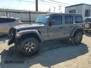 2019 Jeep Wrangler Unlimited Rubicon with VIN 1C4HJXFN1KW502477, listed as a Copart auction lot 52441455 with 53,110 mi miles and Salvage title. Bid and sale history available at DreamBid. Image 1.