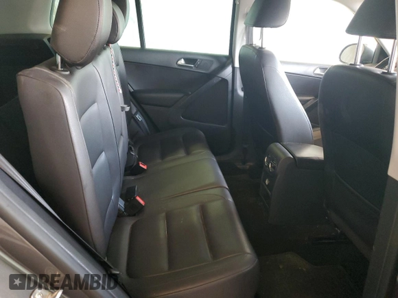 2014 Volkswagen Tiguan SEL with VIN WVGBV3AX2EW541476, listed as a Copart auction lot 64817795 with 158,032 mi miles and Salvage title. Bid and sale history available at DreamBid. Image 11.