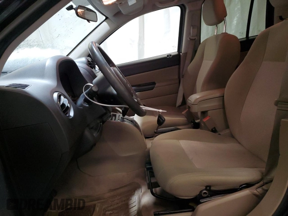 2013 Jeep Compass Sport with VIN 1C4NJDBB1DD113849, listed as a Copart auction lot 88515665 with 132,656 mi miles and Salvage Title. Bid and sale history available at carsss.com. Image 7.