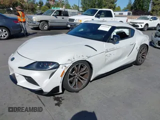 2021 Toyota Supra 2.0 with VIN WZ1DB2C01MW039946, listed as a IAAI auction lot 42519516 with 21,073 mi miles and . Bid and sale history available at DreamBid. Image 2.