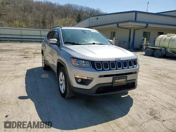 2019 Jeep Compass Latitude with VIN 3C4NJDBB1KT703251, listed as a Copart auction lot 52760895 with 73,026 mi miles and Salvage Title. Bid and sale history available at DreamBid. Image 14.