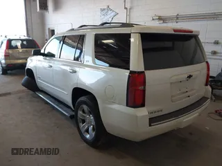 2015 Chevrolet Tahoe LTZ with VIN 1GNSKCKC9FR123996, listed as a IAAI auction lot 42113435 with 149,825 mi miles and . Bid and sale history available at DreamBid. Image 3.