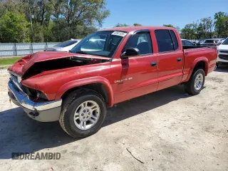 2002 Dodge Dakota SLT z VIN 1B7HL48N02S587177, wystawiony jako Copart lot #48901935 z przebiegiem 207 550 mil mil oraz Szkoda całkowita • Salvage title. Historia ofert i sprzedaży dostępna na DreamBid. Obrazek 1.