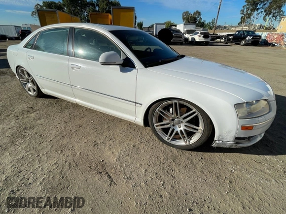 2009 Audi A8 4.2L with VIN WAUMV94E19N002897, listed as a Copart auction lot 64525445 with 140,526 mi miles and Clean title. Bid and sale history available at DreamBid. Image 1.