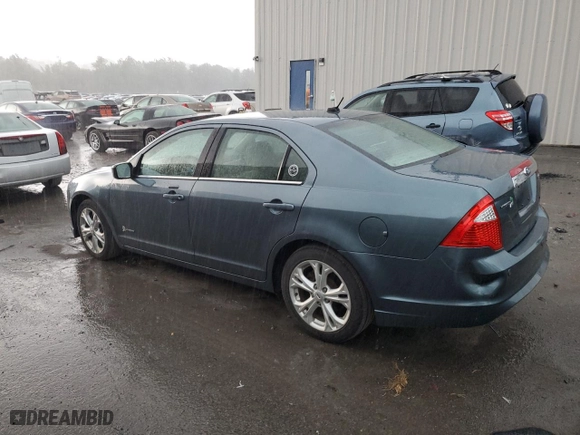 2011 Ford Fusion Hybrid with VIN 3FADP0L33BR253261, listed as a Copart auction lot 59008324 with 100,746 mi miles and Salvage Title. Bid and sale history available at carsss.com. Image 2.