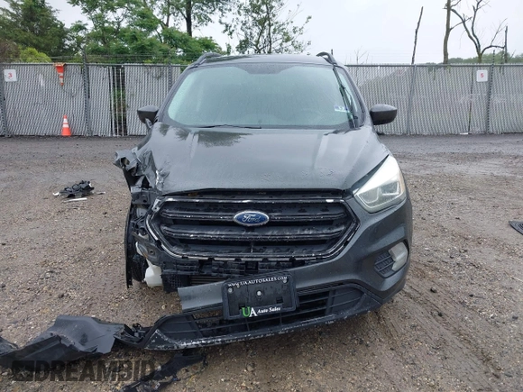 2017 Ford Escape SE z VIN 1FMCU9G95HUC83618, wystawiony jako IAAI lot #42324672 z przebiegiem 132 910 mil mil oraz . Historia ofert i sprzedaży dostępna na DreamBid. Obrazek 12.