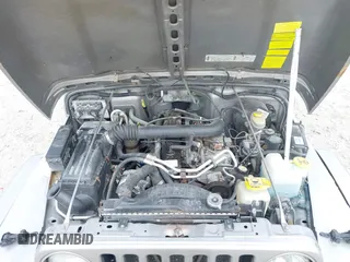 2001 Jeep Wrangler Sport z VIN 1J4FA49S31P349269, wystawiony jako IAAI lot #41427014 z przebiegiem 112 421 mil mil oraz . Historia ofert i sprzedaży dostępna na DreamBid. Obrazek 10.