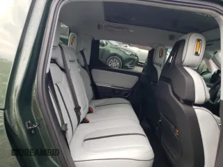 2024 Rivian R1T Adventure z VIN 7FCTGCAA1RN030829, wystawiony jako Copart lot #81459854 z przebiegiem Nie podano mil oraz Szkody całkowita. Historia ofert i sprzedaży dostępna na DreamBid. Obrazek 11.