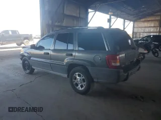 2000 Jeep Grand Cherokee Laredo with VIN 1J4GW48S0YC253091, listed as a Copart auction lot 60357255 with 218,410 mi miles and Clean title. Bid and sale history available at DreamBid. Image 2.