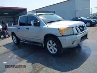 2010 Nissan Titan SE with VIN 1N6BA0ED3AN324773, listed as a IAAI auction lot 41982313 with 270,002 mi miles. Bid and sale history available at carsss.com. Image 1.