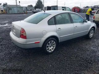 2003 Volkswagen Passat GLS with VIN WVWPD63B23P197123, listed as a IAAI auction lot 41916609 with 205,615 mi miles. Bid and sale history available at carsss.com. Image 4.