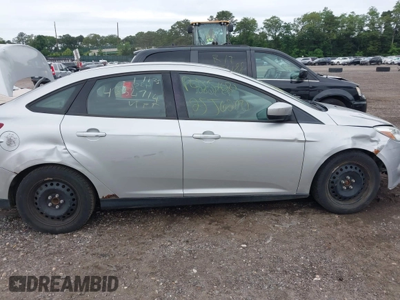 2012 Ford Focus SE with VIN 1FAHP3F29CL353872, listed as a IAAI auction lot 42528943 with Not provided miles and . Bid and sale history available at DreamBid. Image 6.