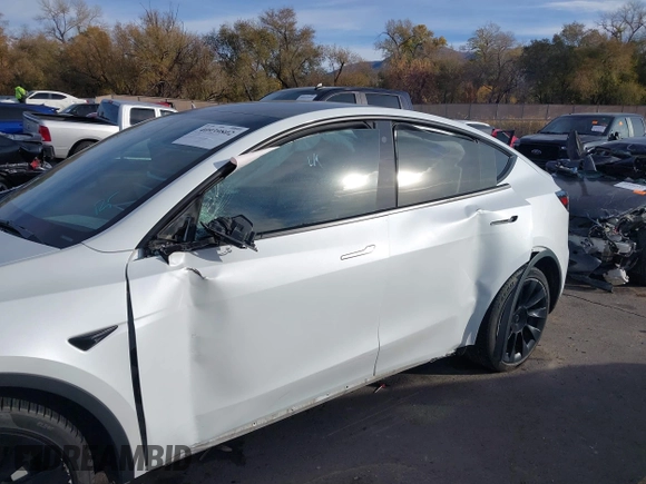 2021 Tesla Model Y Long Range with VIN 5YJYGDEE3MF098586, listed as a IAAI auction lot 40939802 with Not Provided miles and . Bid and sale history available at DreamBid. Image 6.