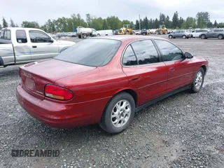 2000 Oldsmobile Intrigue GX z VIN 1G3WH52HXYF300866, wystawiony jako IAAI lot #42315649 z przebiegiem 100 955 mil mil oraz . Historia ofert i sprzedaży dostępna na DreamBid. Obrazek 4.
