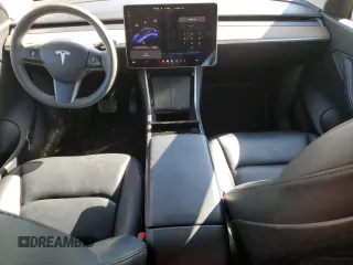 2021 Tesla Model Y Long Range with VIN 5YJYGDEE0MF077789, listed as a Copart auction lot 45838495 with 89,268 mi miles and Salvage Title. Bid and sale history available at DreamBid. Image 8.