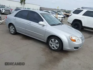 2007 Kia Spectra EX with VIN KNAFE122875430823, listed as a IAAI auction lot 42043409 with 87,777 mi miles. Bid and sale history available at carsss.com. Image 1.