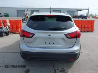 2017 Nissan Rogue SV z VIN JN1BJ1CP5HW030515, wystawiony jako IAAI lot #41892304 z przebiegiem 83 794 mil mil oraz . Historia ofert i sprzedaży dostępna na DreamBid. Obrazek 17.