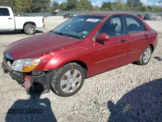 2009 Kia Spectra EX with VIN KNAFE221595630820, listed as a Copart auction lot 72431004 with 136,469 mi miles and Salvage Title. Bid and sale history available at carsss.com. Image 1.