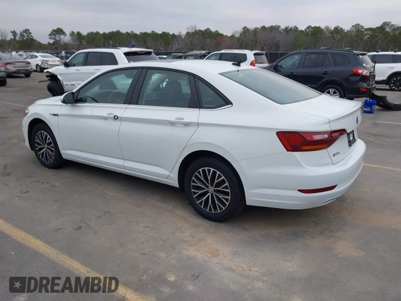 2019 Volkswagen Jetta SEL z VIN 3VWE57BU4KM248989, wystawiony jako IAAI lot #41465186 z przebiegiem 41 985 mil mil oraz . Historia ofert i sprzedaży dostępna na DreamBid. Obrazek 3.