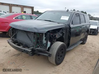 2018 Chevrolet Tahoe Commercial with VIN 1GNLCDEC3JR221708, listed as a IAAI auction lot 41157325 with 163,845 mi miles. Bid and sale history available at carsss.com. Image 18.