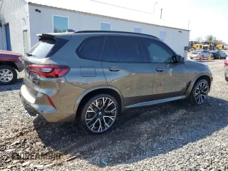 2023 BMW X5 M z VIN 5YMJU0C01P9P15368, wystawiony jako Copart lot #50782505 z przebiegiem Nie podano mil oraz Szkody całkowita. Historia ofert i sprzedaży dostępna na DreamBid. Obrazek 3.