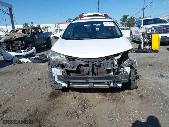 2015 Toyota RAV4 XLE with VIN JTMWFREV9FJ034992, listed as a IAAI auction lot 41922694 with 100,956 mi miles. Bid and sale history available at carsss.com. Image 6.