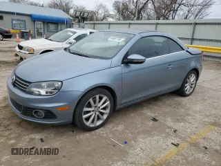 2013 Volkswagen Eos Komfort с VIN WVWBW8AH4DV001042, выставлен на аукционе Copart как лот 49492745 с пробегом 119 825 миль миль и Списание • Salvage title. История ставок и продаж доступна на DreamBid. Изображение 1.
