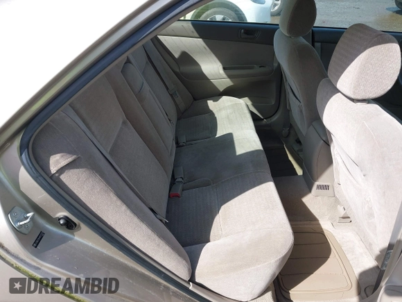 2004 Toyota Camry LE with VIN JTDBE32K440272373, listed as a IAAI auction lot 41949768 with 205,093 mi miles. Bid and sale history available at carsss.com. Image 8.