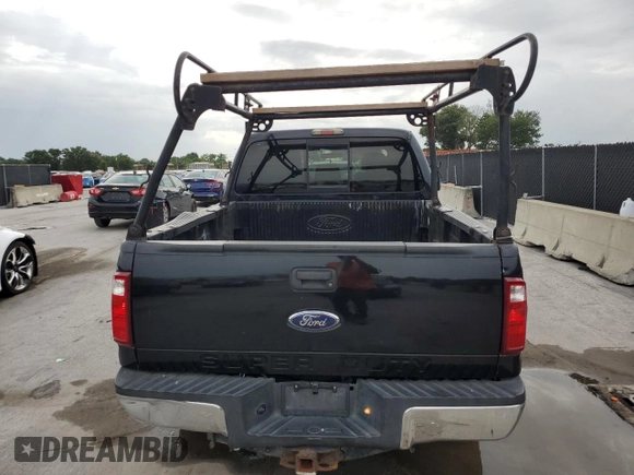 2011 Ford F-250 XL with VIN 1FT7W2BT4BEB22981, listed as a Copart auction lot 64594735 with 381,861 mi miles and Salvage title. Bid and sale history available at DreamBid. Image 6.
