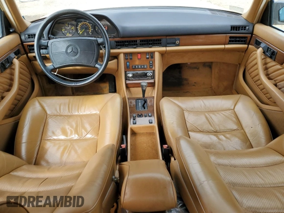 1989 Mercedes-Benz 300 with VIN WDBCA24D2KA430787, listed as a Copart auction lot 50655785 with 145,064 mi miles and Salvage Title. Bid and sale history available at DreamBid. Image 8.