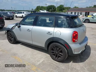 2013 MINI Countryman S z VIN WMWZC3C50DWP21636, wystawiony jako IAAI lot #42113244 z przebiegiem 85 344 mil mil oraz . Historia ofert i sprzedaży dostępna na DreamBid. Obrazek 3.
