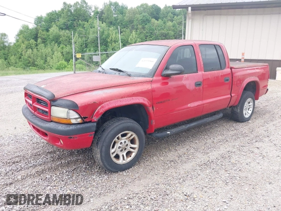 2002 Dodge Dakota Sport with VIN 1B7HG38N62S670613, listed as a IAAI auction lot 42133366 with 156,977 mi miles and . Bid and sale history available at carsss.com. Image 2.