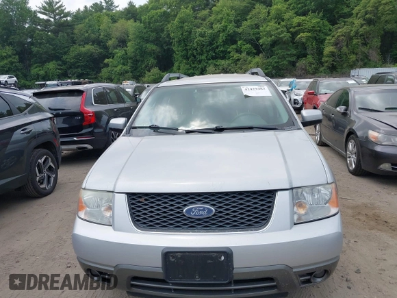 2005 Ford Freestyle SEL z VIN 1FMZK02165GA74170, wystawiony jako IAAI lot #42429482 z przebiegiem 77 047 mil mil oraz . Historia ofert i sprzedaży dostępna na DreamBid. Obrazek 13.