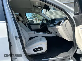 2023 BMW X7 xDrive40i with VIN 5UX23EM03P9P67515, listed as a Copart auction lot 52912265 with 29,365 mi miles and Clean Title. Bid and sale history available at carsss.com. Image 9.