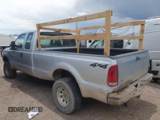 2001 Ford F-250 XL with VIN 1FTNX21L31EB70699, listed as a Copart auction lot 60620065 with 156,033 mi miles and Clean title. Bid and sale history available at DreamBid. Image 2.