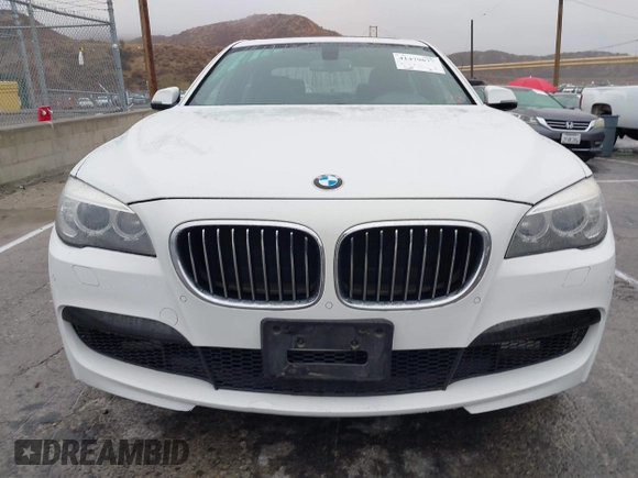 2013 BMW 7 Series 740i with VIN WBAYA6C57DC995338, listed as a IAAI auction lot 41479077 with 123,680 mi miles and . Bid and sale history available at DreamBid. Image 6.