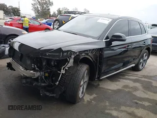 2023 Audi Q5 Premium Plus z VIN WA1BBAFY7P2187588, wystawiony jako IAAI lot #42052046 z przebiegiem 18 987 mil mil oraz . Historia ofert i sprzedaży dostępna na DreamBid. Obrazek 2.