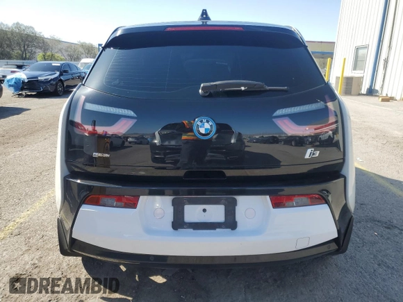 2014 BMW i3 with VIN WBY1Z4C51EV276642, listed as a Copart auction lot 52571115 with 112,178 mi miles and Salvage title. Bid and sale history available at DreamBid. Image 6.