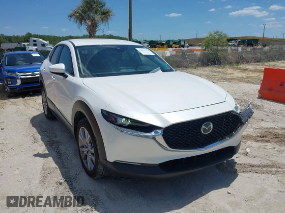 2021 Mazda CX-30 Select with VIN 3MVDMABL3MM232497, listed as a IAAI auction lot 42033929 with 33,050 mi miles. Bid and sale history available at carsss.com. Image 1.