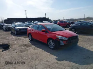2016 Ford Focus SE z VIN 1FADP3F21GL350033, wystawiony jako IAAI lot #41784746 z przebiegiem 144 890 mil mil oraz . Historia ofert i sprzedaży dostępna na DreamBid. Obrazek 1.