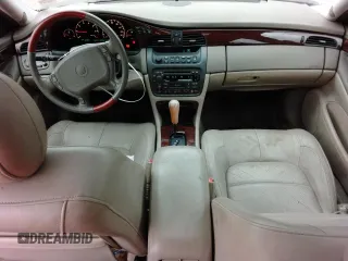 2000 Cadillac DeVille DTS z VIN 1G6KF5794YU249059, wystawiony jako Copart lot #71614494 z przebiegiem 121 611 mil mil oraz Szkoda całkowita • Salvage title. Historia ofert i sprzedaży dostępna na DreamBid. Obrazek 8.