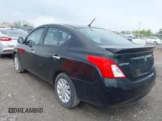 2014 Nissan Versa SV with VIN 3N1CN7AP2EK464770, listed as a IAAI auction lot 42191565 with 101,349 mi miles and . Bid and sale history available at carsss.com. Image 3.