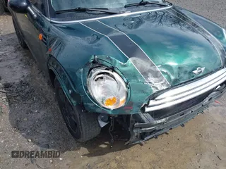 2012 MINI Hardtop with VIN WMWSU3C52CT367259, listed as a IAAI auction lot 39129362 with 121,364 mi miles and . Bid and sale history available at DreamBid. Image 12.