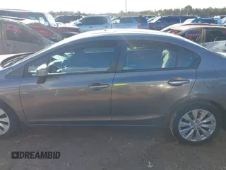 2012 Honda Civic EX with VIN 19XFB2F81CE380880, listed as a IAAI auction lot 41595729 with 118,286 mi miles and . Bid and sale history available at DreamBid. Image 14.